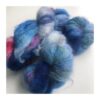 WestWooly Fat Mohair er et tykt mohairgarn i en dejlig tykkelse. Dette garn er enormt blødt med en god fylde og kan bruges i mange sammenhænge, som eks de lune sweatre på større pinde. Garnet kan bruges alene eller sammen med en tråd ufarvet merino, merino/Tencel, Merino/silke eller merino single. Jeg håndfarver alle fed i små partier, husk derfor at bestille fed nok til dit projekt Fiberindhold: 78% kid mohair, 13% merino, 9% nylon Anbefalet pind: 7-10 mm Løbelængde: 200 meter / 100 g i hvert fed Vaskeanvisning: håndvask 30 grader, gerne med uldsæbe, slynges i vaskepose i maskine, tørres liggende Håndfarvet garn er et spændende og interessant materiale at arbejde med.  Alle fed er farvet i hånden og helt unikke.Derfor vil der opleves forskelle i de enkelte fed. Når du strikker med håndfarvet garn, kan du med fordel strikke med to forskellige nøgler på samme tid. Strik eks. 2-5 omgange med hvert nøgle, hvormed du  